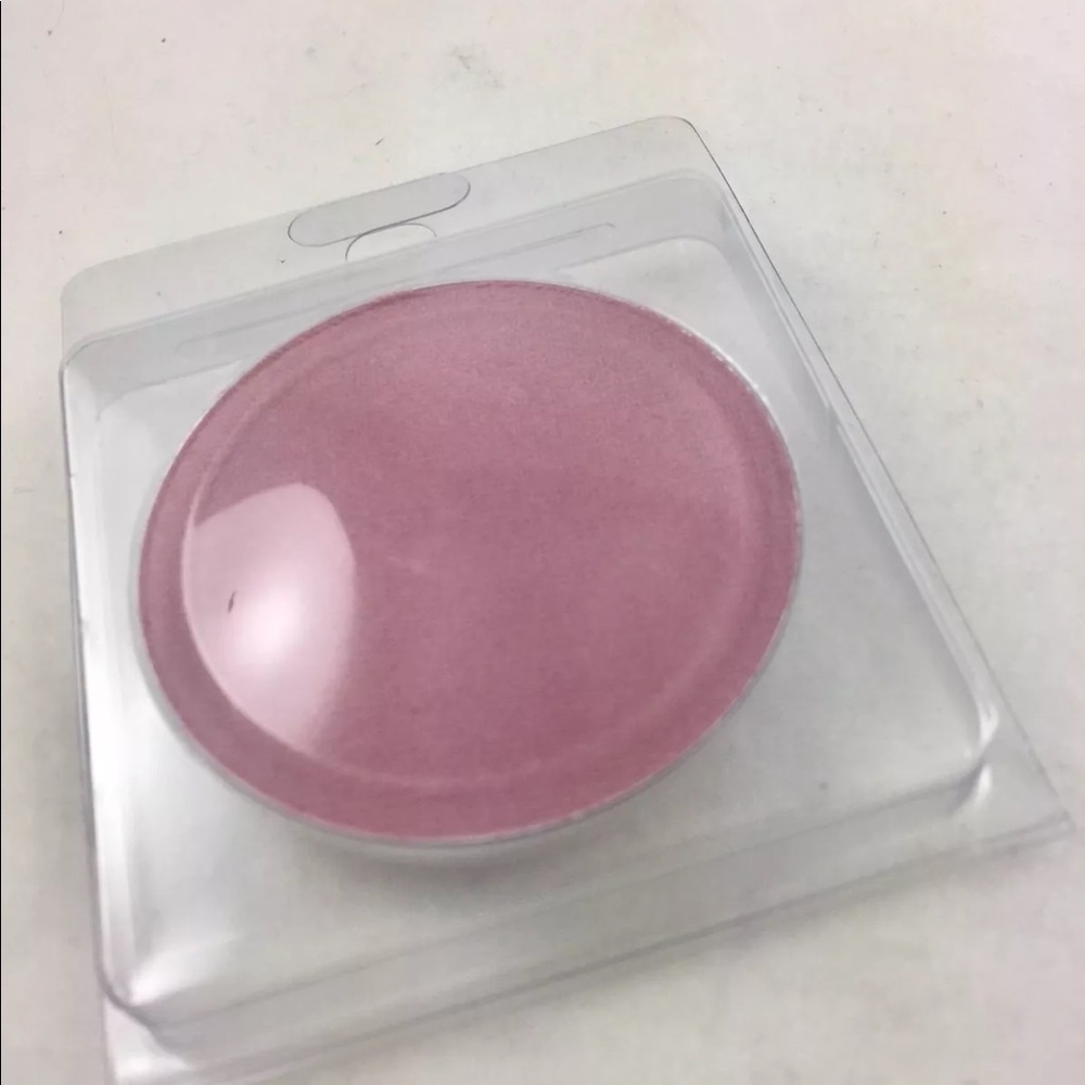 Becca Pressed Shimmer Powder Gypsy Lit from within